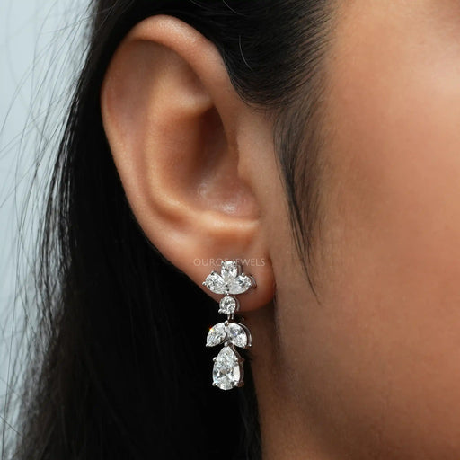 [A Women wearing pear and maquise lab grown drop earrings]-[Ouros Jewels]