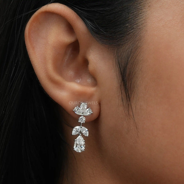 [ A Women wearing multi stone drop earrings]-[Ouros Jewels]