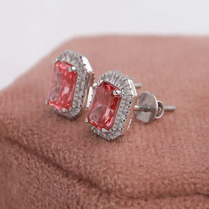 Pink radiant cut stud earrings with halo settings  in white gold