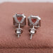 Screw back setting in solid white gold of radiant cut diamond earrings