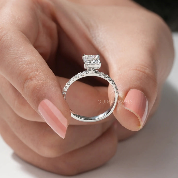 [A Women Holding Princess Cut Diamond Ring]-[Ouros Jewels]