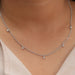 [A Women wearing Princess Cut Diamodn Necklace in Station Style]-[Ouros Jewels]