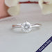 Round cut lab grown diamond engagement ring with six prongs setting in 14k white gold