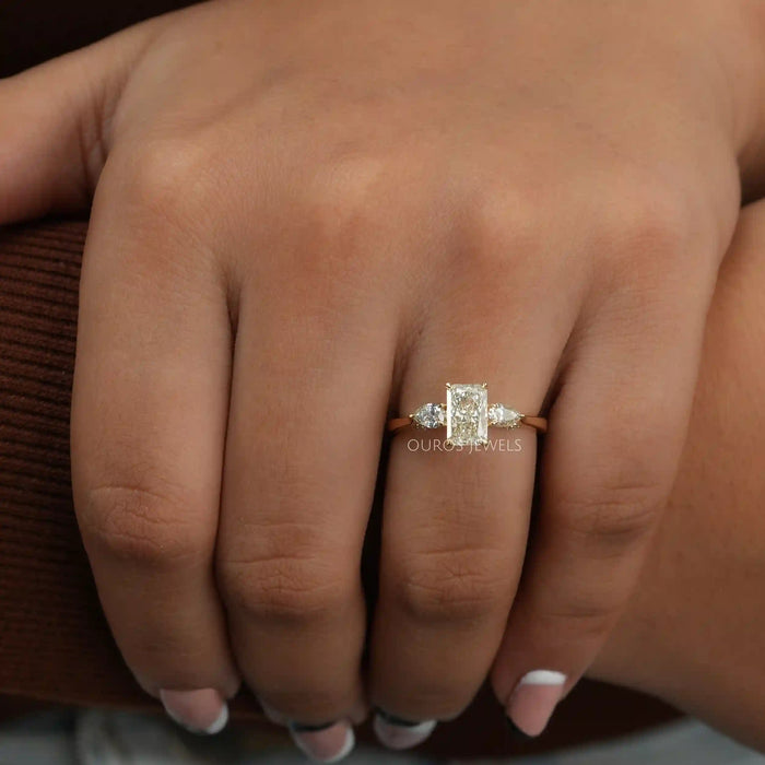 [A Women wearing Radiant and Pear Cut Engagement Ring]-[Ouros Jewels]