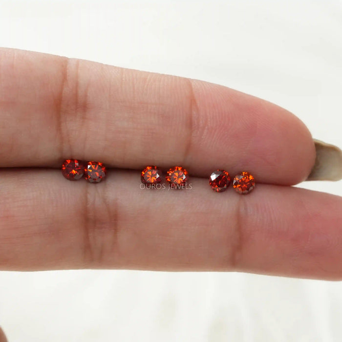 [On Hand View Of Red Color Lab Diamonds]-[Ouros Jewels]
