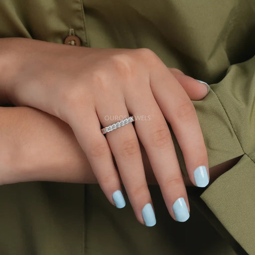 [A Women wearing Round Cut Diamond Eternity Ring]-[Ouros Jewels]