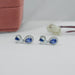 Pear Blue Gemstone And Tapered Baguette Halo Drop Earrings Earrings