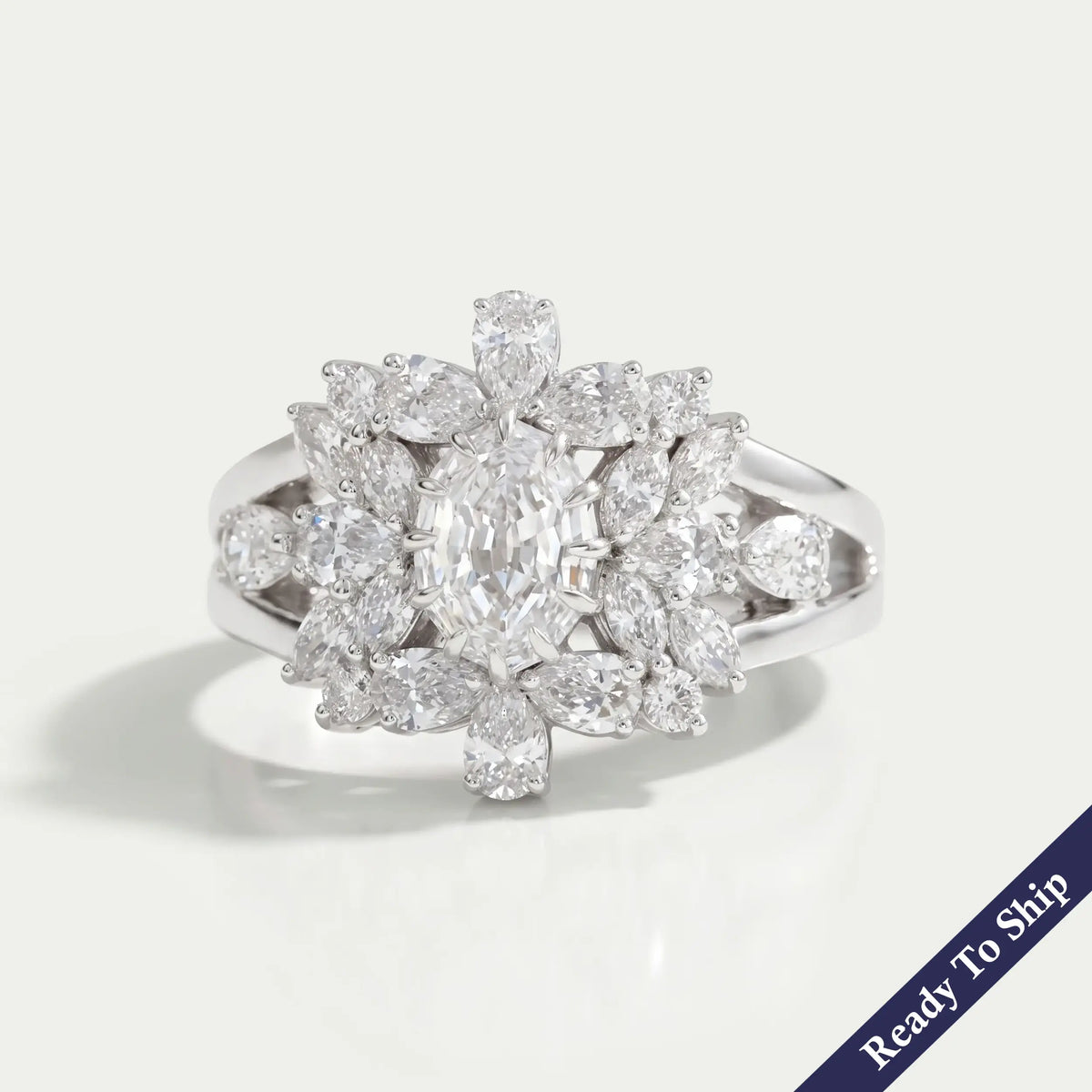 Step Cut Oval Diamond Cluster Engagement Ring