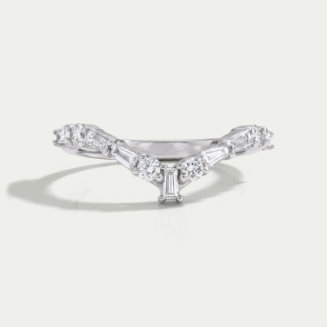 Tapered Baguette and Round Chevron Wedding Band Rings