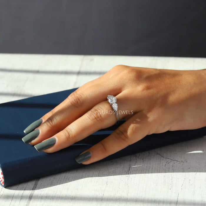 [A Women wearing Classic Three Stone Engagement Ring]-[Ouros Jewels]