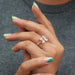 A Women wearing Toi Et Moi Engagement Ring