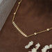 Zigzag Line Bar Chain Necklace on Brown Background 