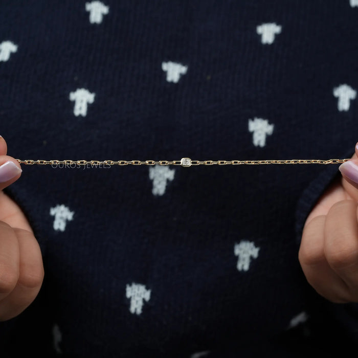 [A Women holding a Bezel Chain Set Bracelet]-[Ouros Jewels]