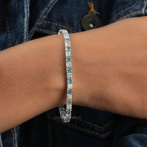 [A Women wearing Blue Cushion Diamond Bracelet]-[Ouros Jewels]
