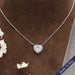 [a necklace with a heart shaped diamond on it]-[Ouros Jewels]