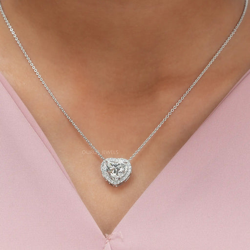 [ A women wearing heart diamond pendant]-[Ouros Jewels]