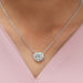 [ A women wearing heart diamond pendant]-[Ouros Jewels]