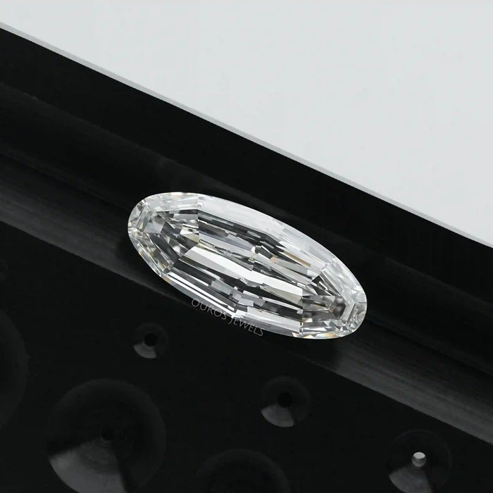 [ a pair of step cut long oval diamond with black background]-[Ouros Jewels]