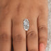 [ a woman's hand with a oval diamond on it]-[Ouros Jewels]