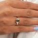 [A Women wearing Olive Radiant and Trapezoid Diamond Ring]-[Ouros Jewels]
