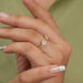 [A Women wearing Pear and Round Toi Et Moi Engagement Ring]-[Ouros Jewels]