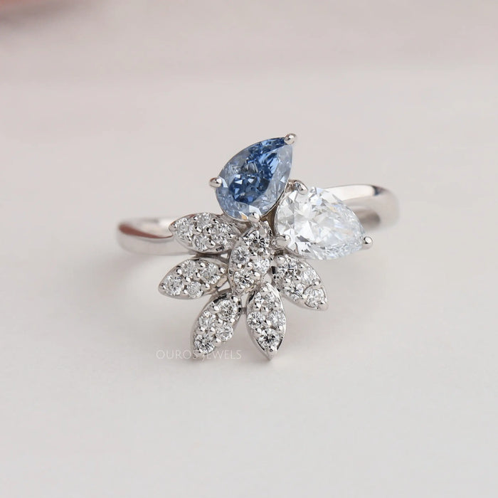 Blue pear and round vintage diamond engagement ring