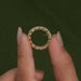 [A Women holding Pear Diamond Eternity Wedding Band]-[Ouros Jewels]