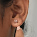 [A Women showing Pink Diamond Bezel Set Earrings]-[Ouros Jewels]