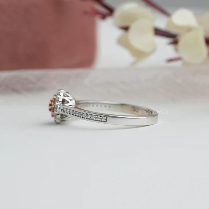 Side View of Round Cut Engagement Ring on White Background