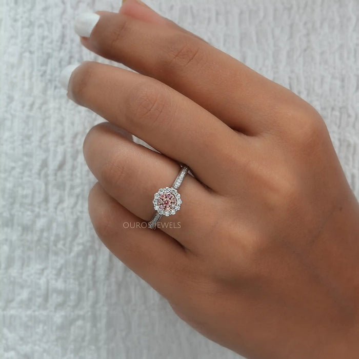 A Women wearing White and Rose Gold Ring
