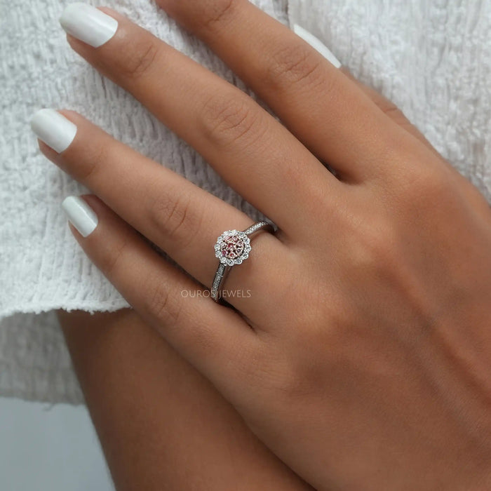 A Women wearing Pink Round Cut Wedding Ring 