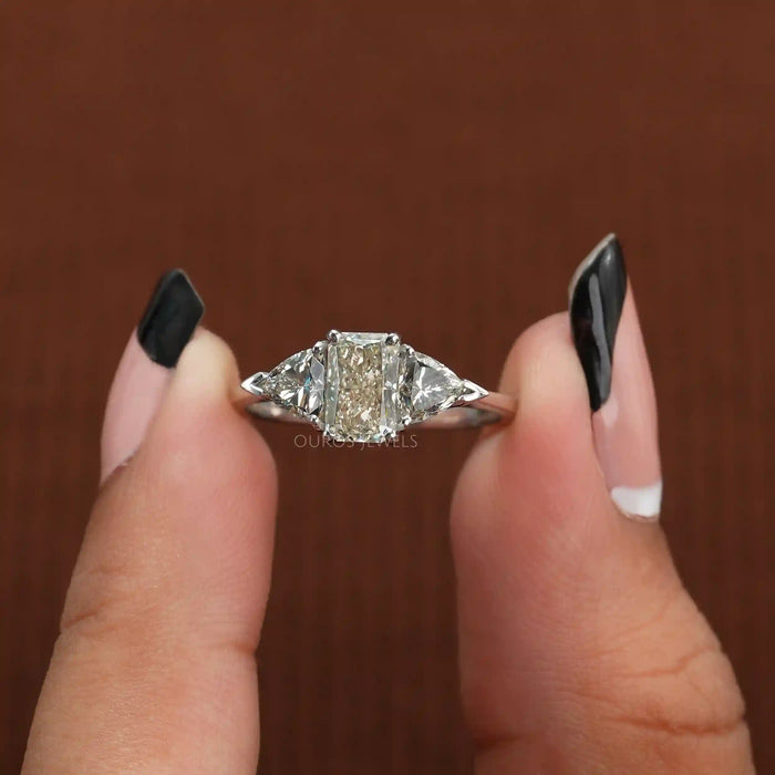 [A Women Holding Radiant Cut Diamond Ring]-[Ouros Jewels]