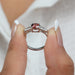 Three stone lab diamond engagement ring made with red round and bullet cut diamonds
