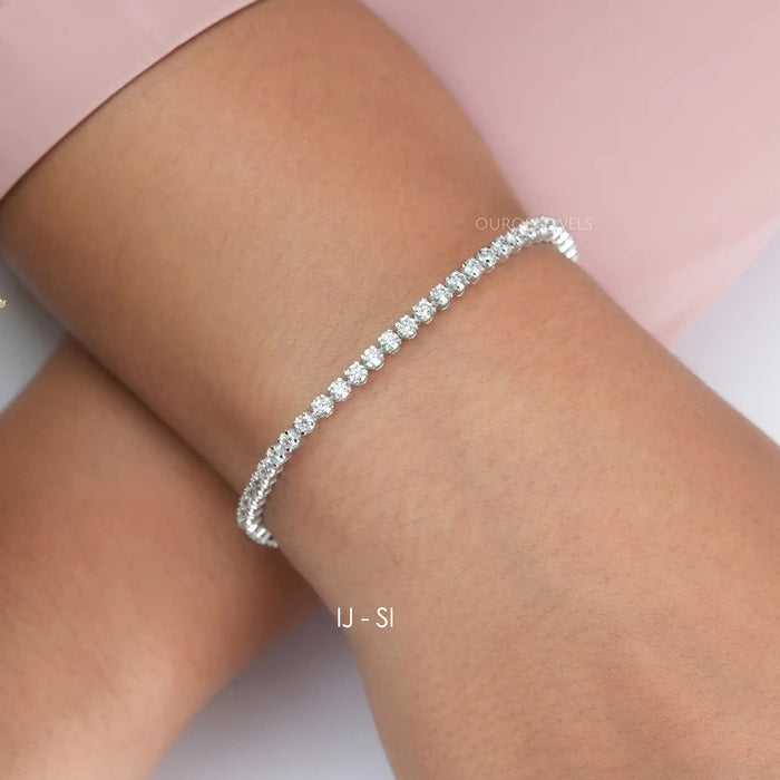 [A Women wearing Round Diamond Tennis Bracelet]-[Ouros Jewels]