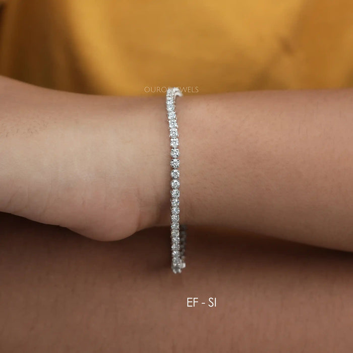 [A Women wearing 7 inch Round Lab Diamond Tennis Bracelet]-[Ouros Jewels]