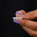 [A Women holding Round Lab Diamond Eternity Band]-[Ouros Jewels]