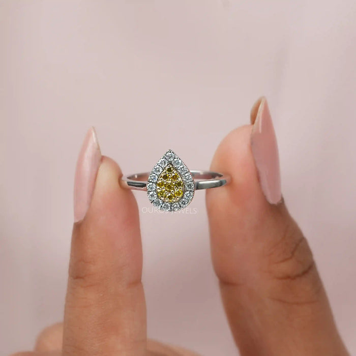 [A Women holding Yellow Round Diamond Engagement Ring]-[Ouros Jewels]