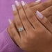 Cross hand finger ring view, vintage asscher diamond ring in VS clarity. 