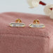 A pair of antique lab diamond stud earrings in solid gold