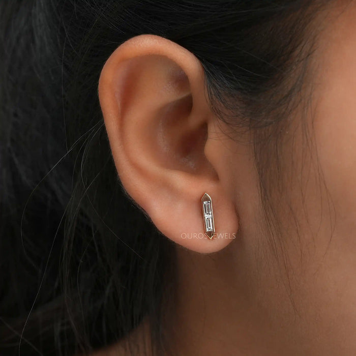 In ear look of bar stud earrings with baguette lab created diamonds