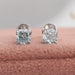 A pair of brilliant cushion shaped lab diamond earrings