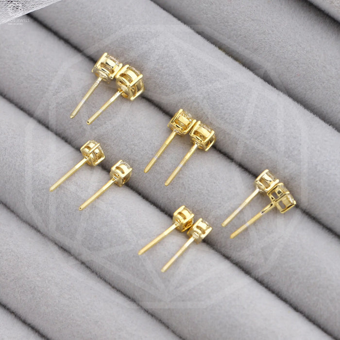 Lab grown diamond stud earrings with screw back setting for stability in yellow gold