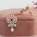 A close up look of floral lab made diamond earrings with sparkling setting and screw back style in rose gold