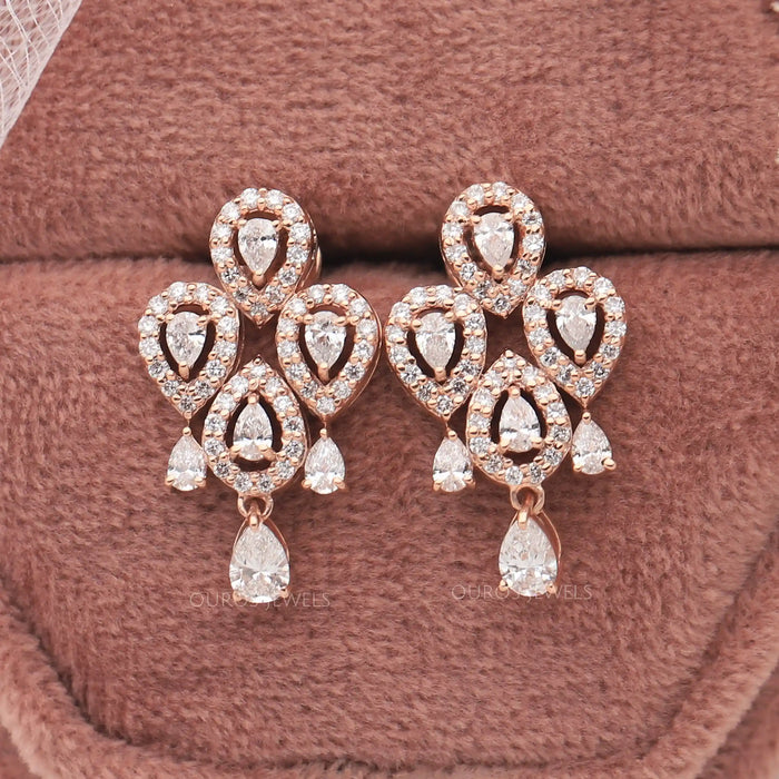 Glittering pear shaped lab made diamond earrings, a perfect gift to show your love to her