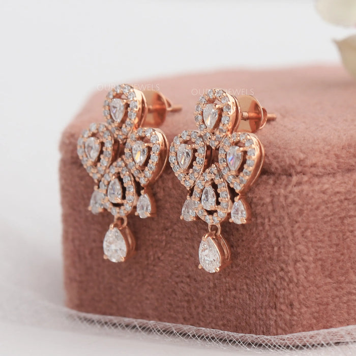 Rose gold diamond earrings with screw back setting crafted in 14k rose gold