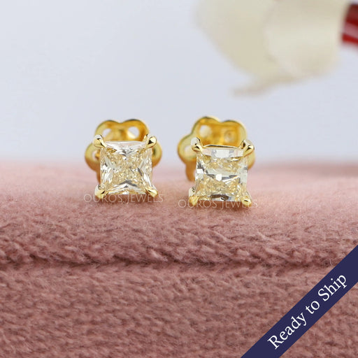 Yellow princess cut lab grown diamond stud earrings in 14k yellow gold