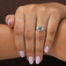 [A Women wearing Blue Emerald Cut Diamond Ring]-[Ouros Jewels]
