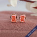 Front view of radiant cut pink stud earrings crafted in rose gold with 4 prongs.