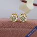 Yellow gold round brilliant cut lab diamond stud earrings in VS clarity and claw prongs