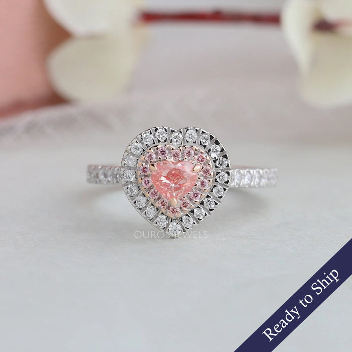 Front look of double halo heart shaped pink color diamond ring crafted with 14k white gold, this ring crafted round cut small diamonds.
